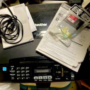 Brother MFC-255CW printer.  Comes with extra magenta color, handbooks, cd’s